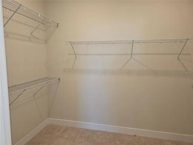 a bathroom with 2 sink and a mirror