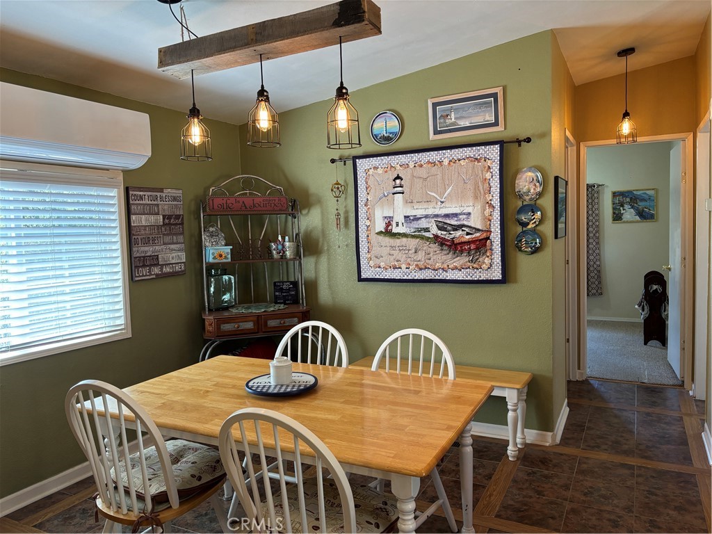 4060 Indian Peak Road Mariposa, CA 95338 - Photo 30 of 60 a view of a dining room and hall with furniture