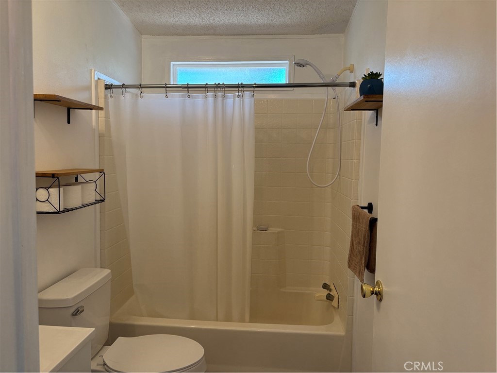 4060 Indian Peak Road Mariposa, CA 95338 - Photo 35 of 60 a bathroom with a shower and a toilet