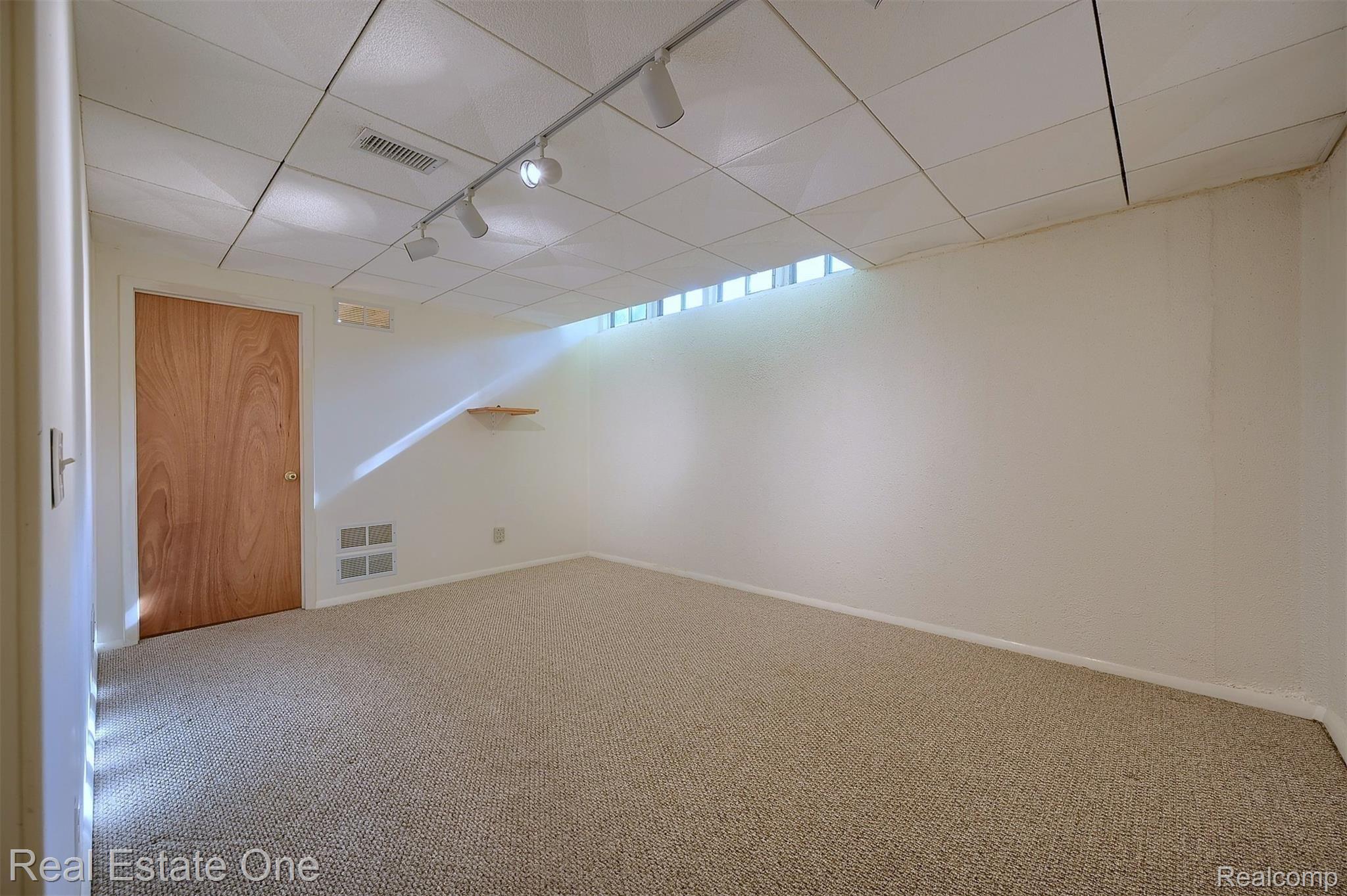 1360 Crescent Lane, Unit 304 Rochester, MI 48306 - Photo 27 of 41 Finished-Lower-Level with Track Lights