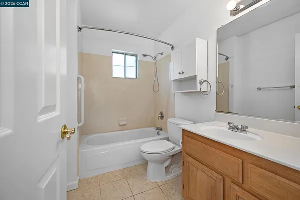 a bathroom with a sink a toilet and a bathtub