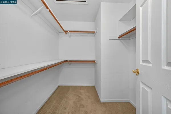 a view of small space with racks on the wall
