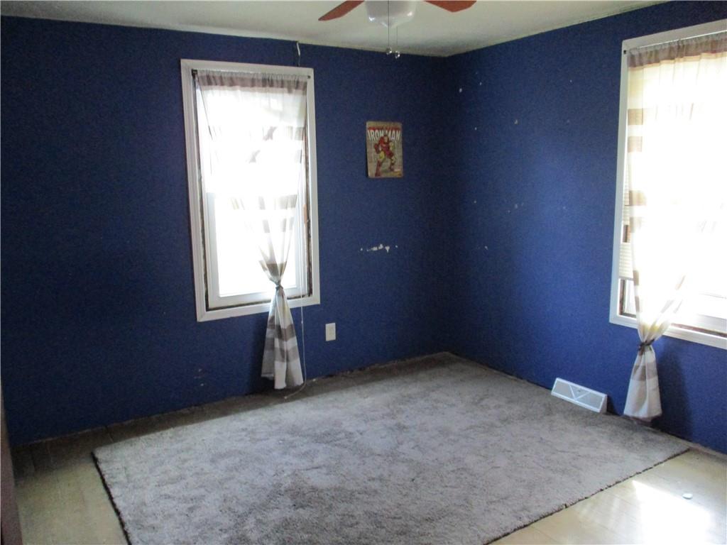 320 Main Street Lyndora, PA 16045 - Photo 10 of 11 an empty room with windows