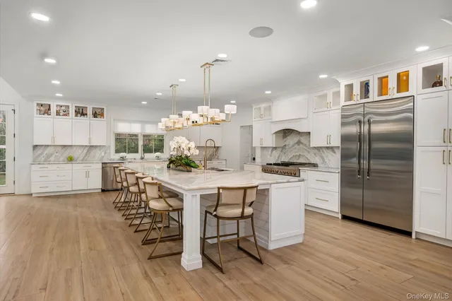 a view of a kitchen and dining room