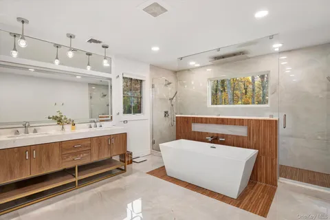 a bedroom with bed and window