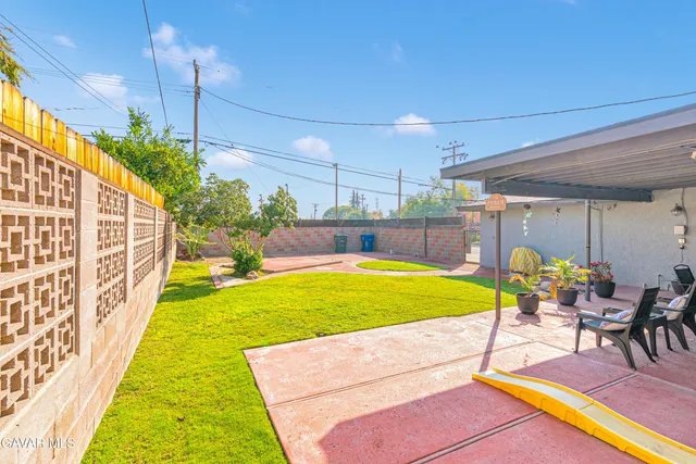 a view of swimming pool with outdoor seating
