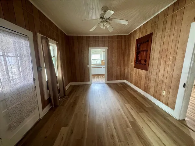 a view of gallery with wooden floor