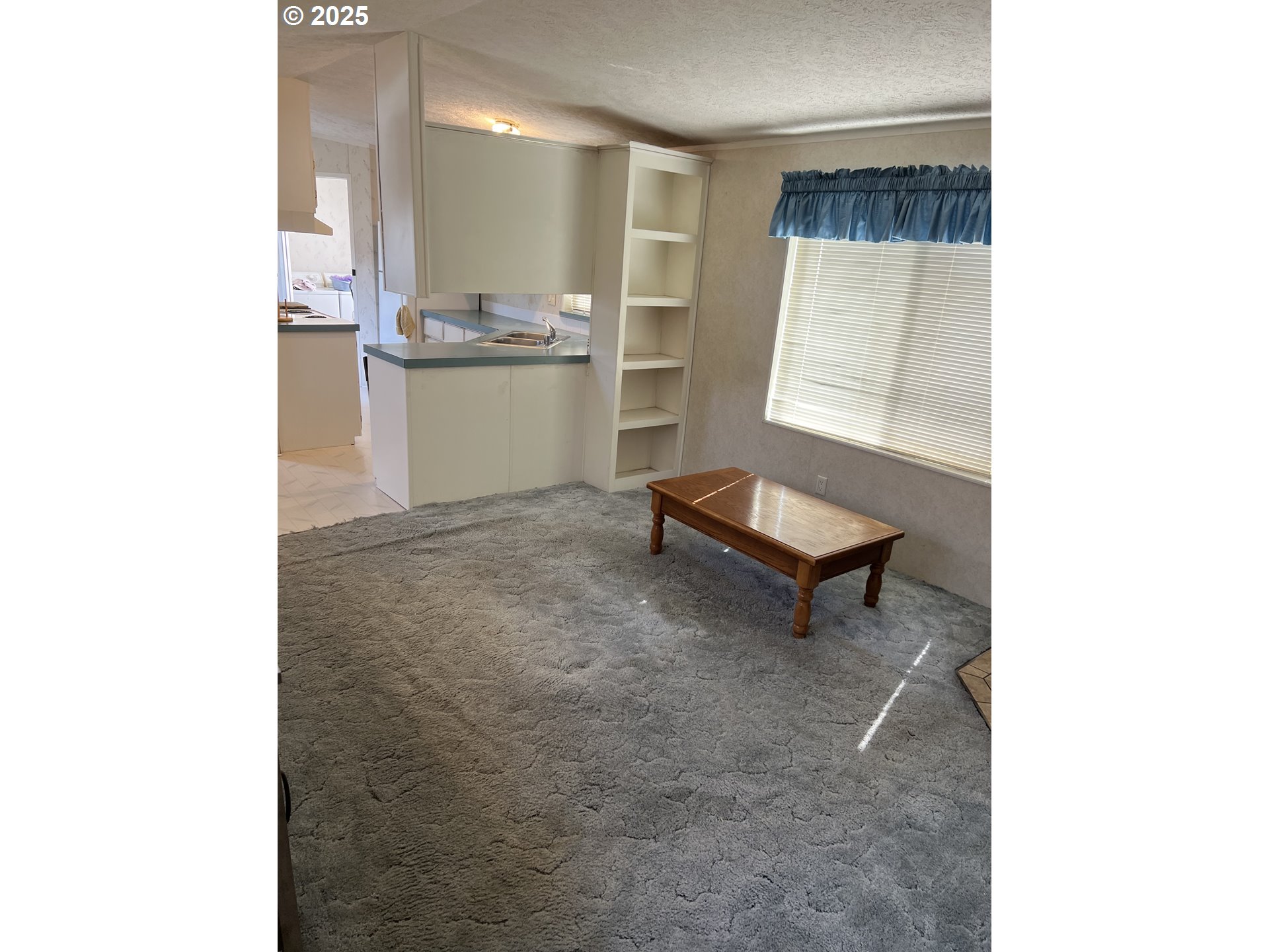 2801 Southwest Hautama Road Pendleton, OR 97801 - Photo 10 of 11 a living room with a couch and a table