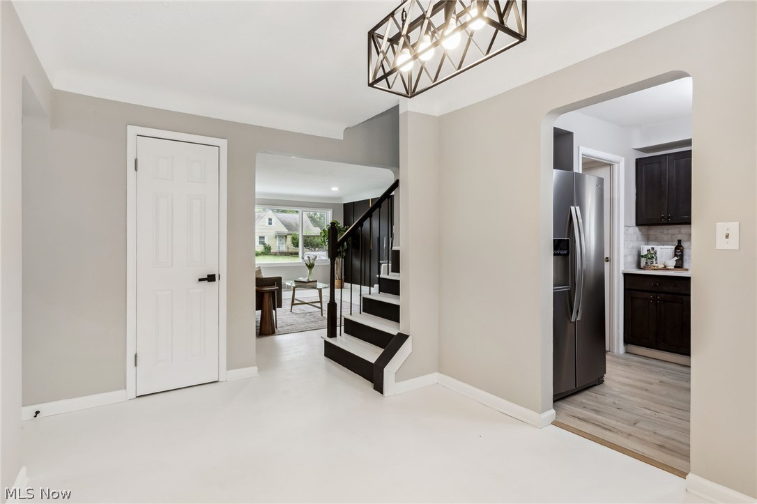 1407 Sunview Road Lyndhurst, OH 44124 - Photo 7 of 33 Hallway with light hardwood / wood-style floors