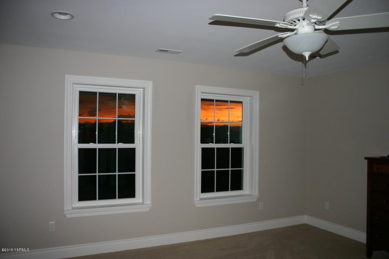 3801 Wiley Road Yakima, WA 98903 - Photo 16 of 20 a view of empty room with windows and fan