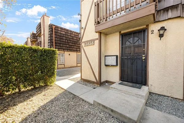 a view of a front door and outdoor space