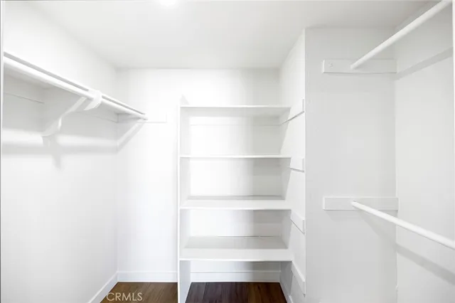 a view of an empty walk in closet