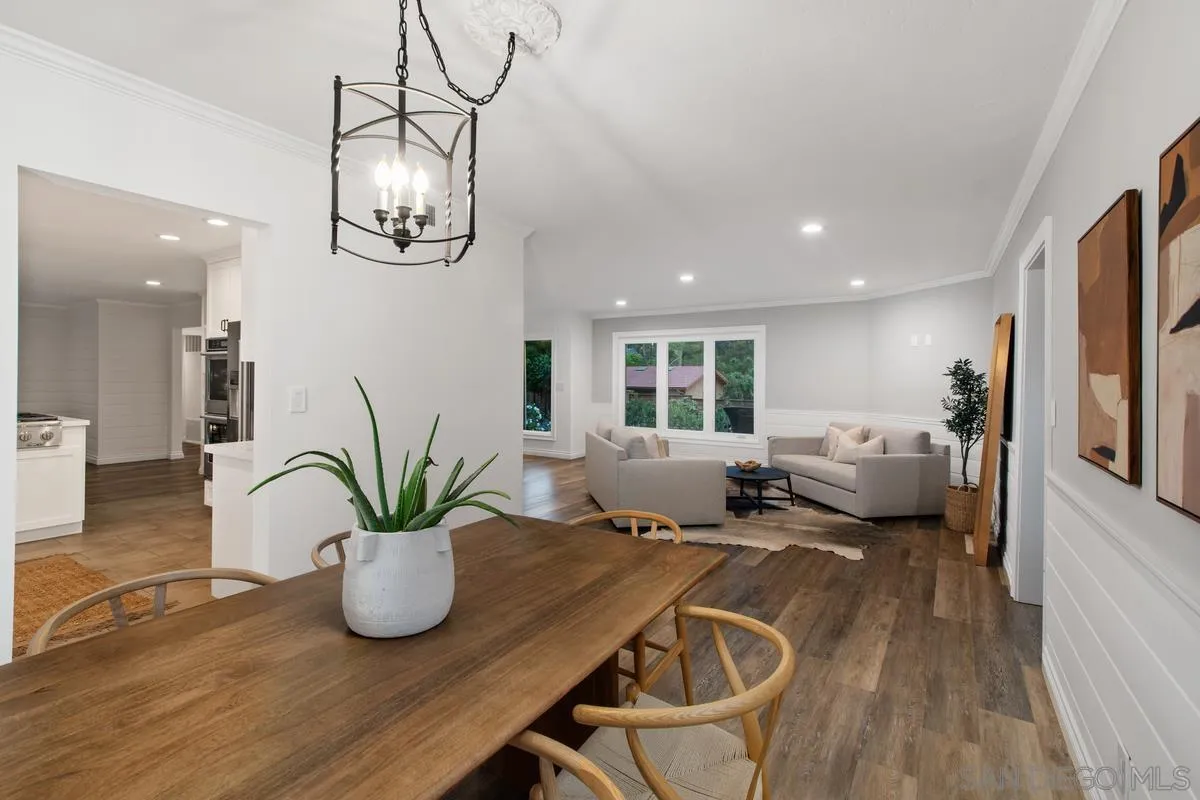 16852 Orchard Bend Road Poway, CA 92064 - Photo 11 of 39 a living room with furniture potted plant and a window