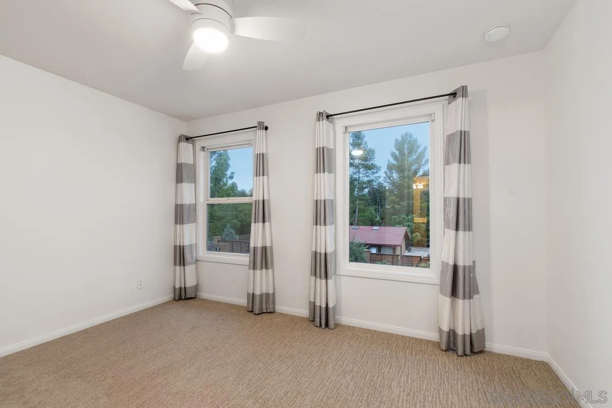 16852 Orchard Bend Road Poway, CA 92064 - Photo 20 of 39 a view of a room with a floor to ceiling window and an empty room