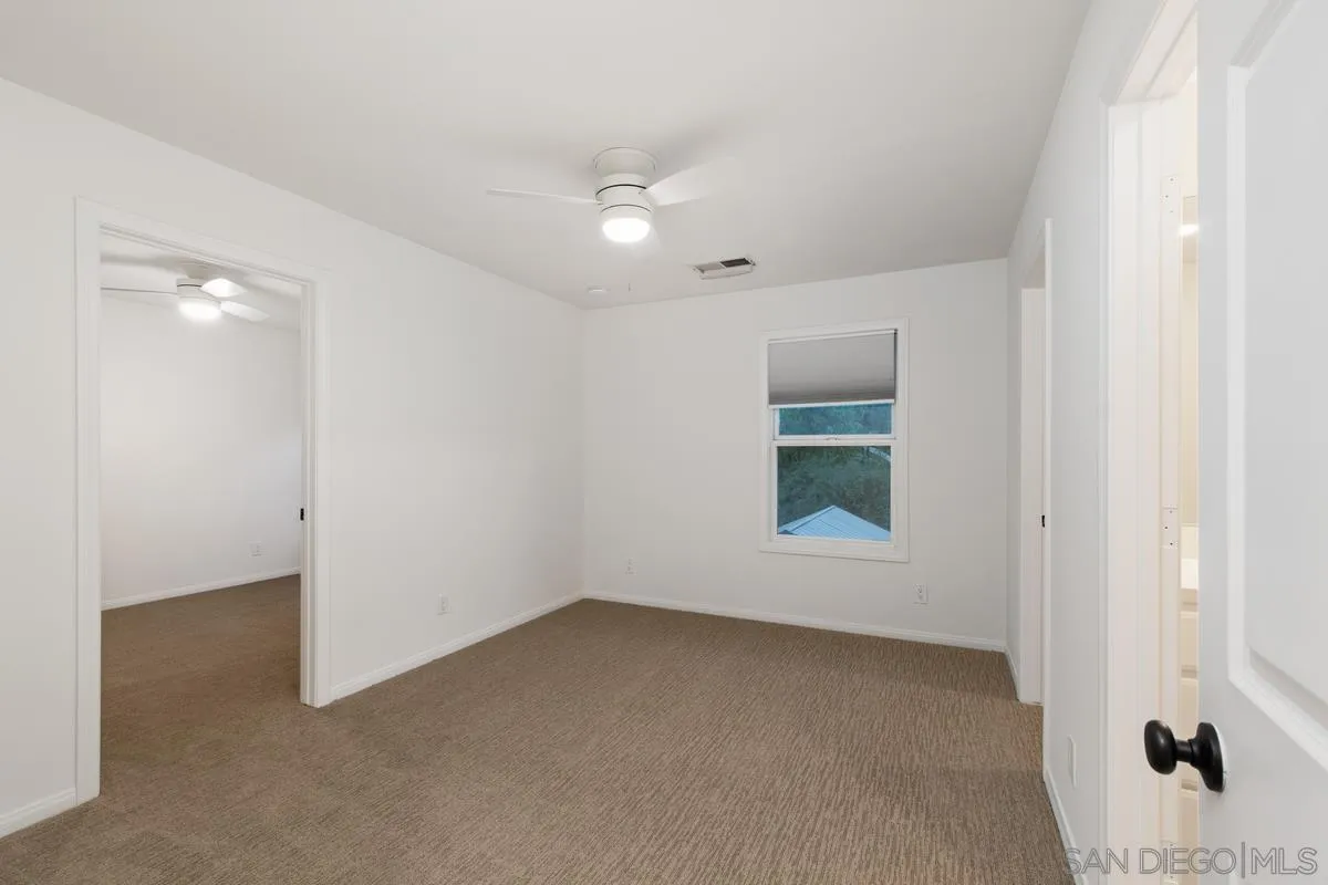 16852 Orchard Bend Road Poway, CA 92064 - Photo 22 of 39 an empty room with a window