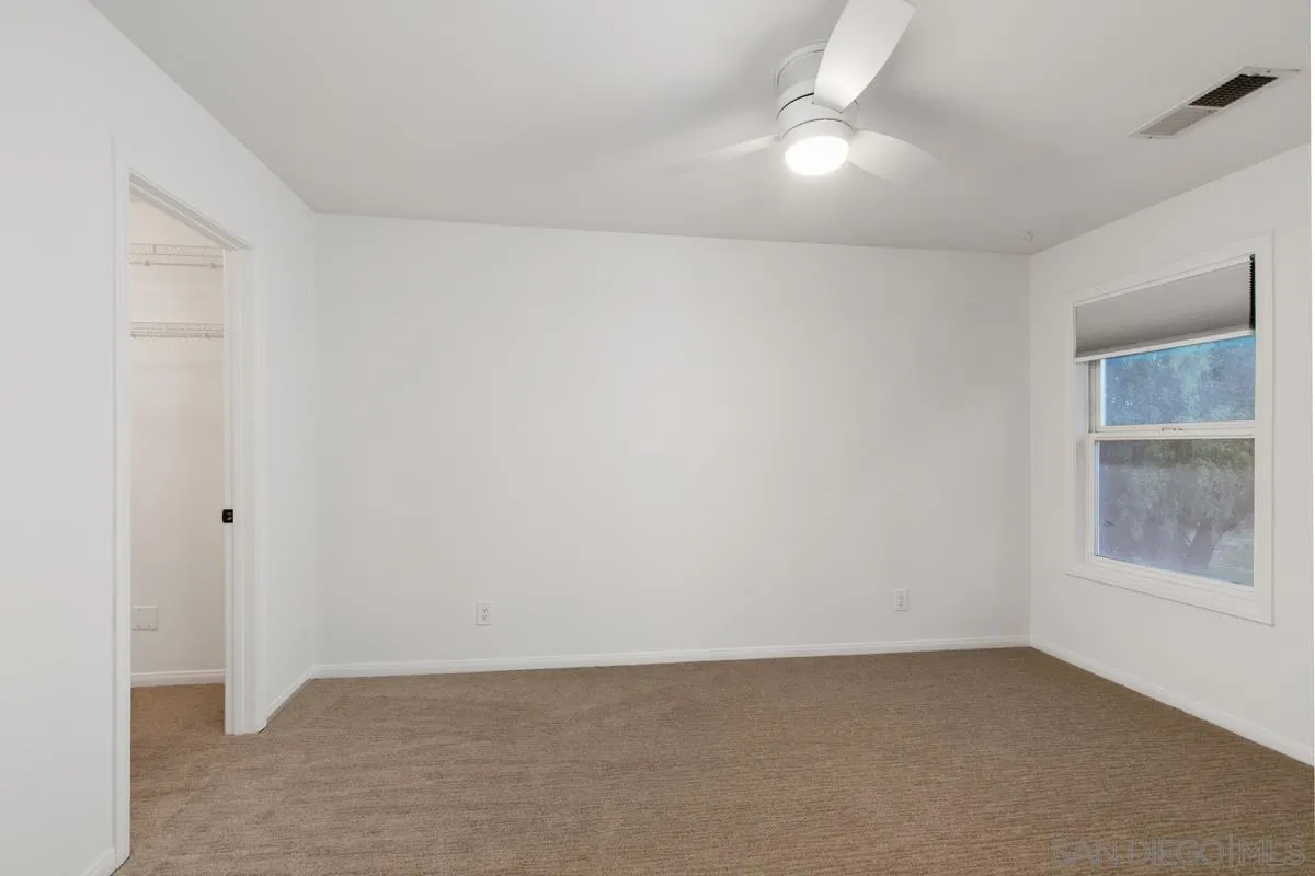 16852 Orchard Bend Road Poway, CA 92064 - Photo 23 of 39 a view of an empty room with a window