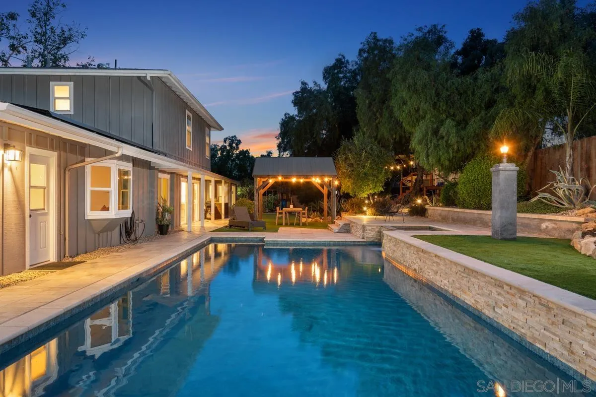 16852 Orchard Bend Road Poway, CA 92064 - Photo 29 of 39 a view of a house with swimming pool and sitting area