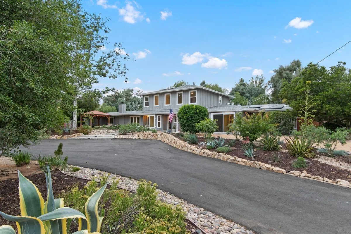 16852 Orchard Bend Road Poway, CA 92064 - Photo 3 of 39 a view of a house with a yard and garden