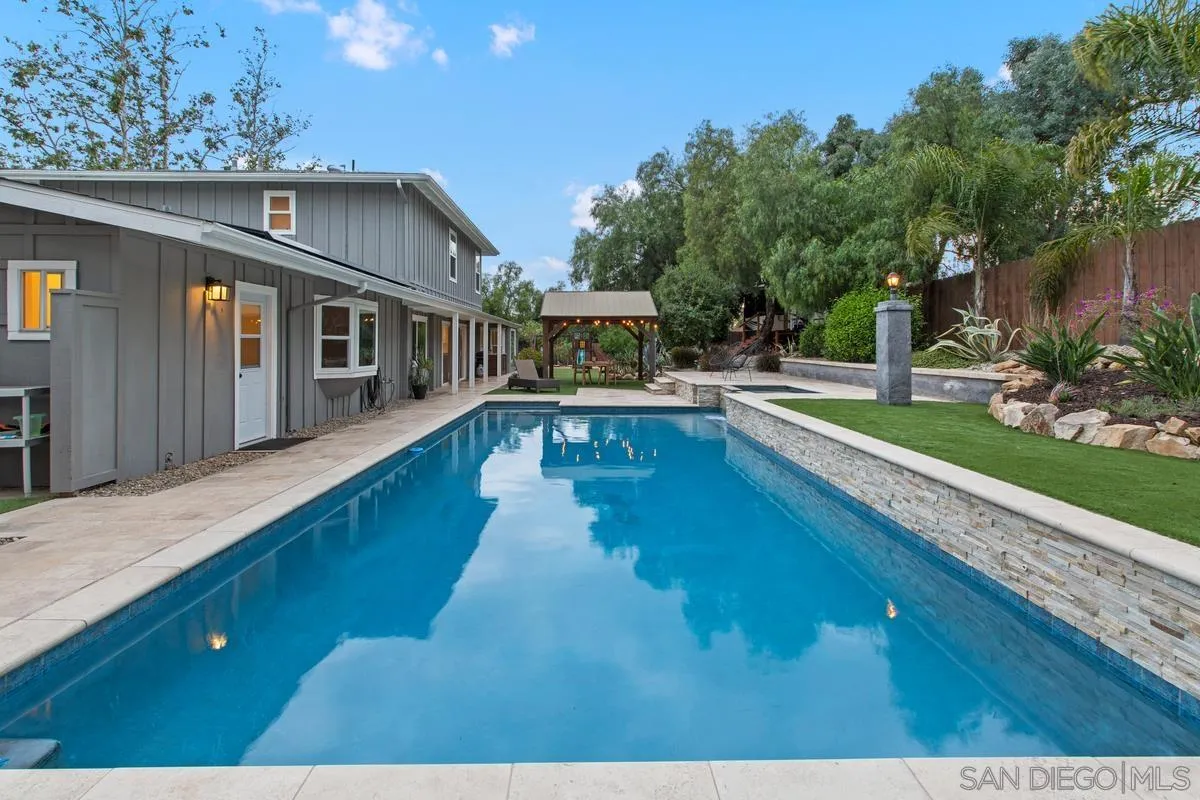16852 Orchard Bend Road Poway, CA 92064 - Photo 31 of 39 a view of a house with swimming pool
