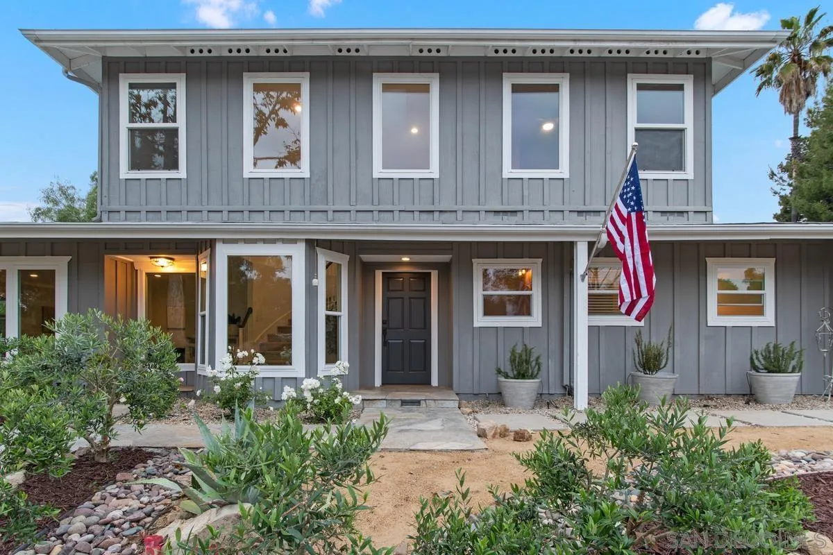 16852 Orchard Bend Road Poway, CA 92064 - Photo 33 of 39 front view of a brick house with a large windows