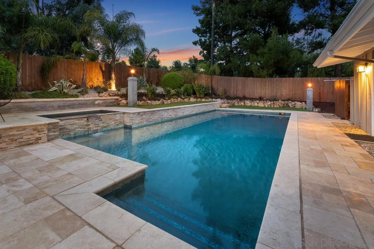 16852 Orchard Bend Road Poway, CA 92064 - Photo 5 of 39 a view of a swimming pool with an outdoor space