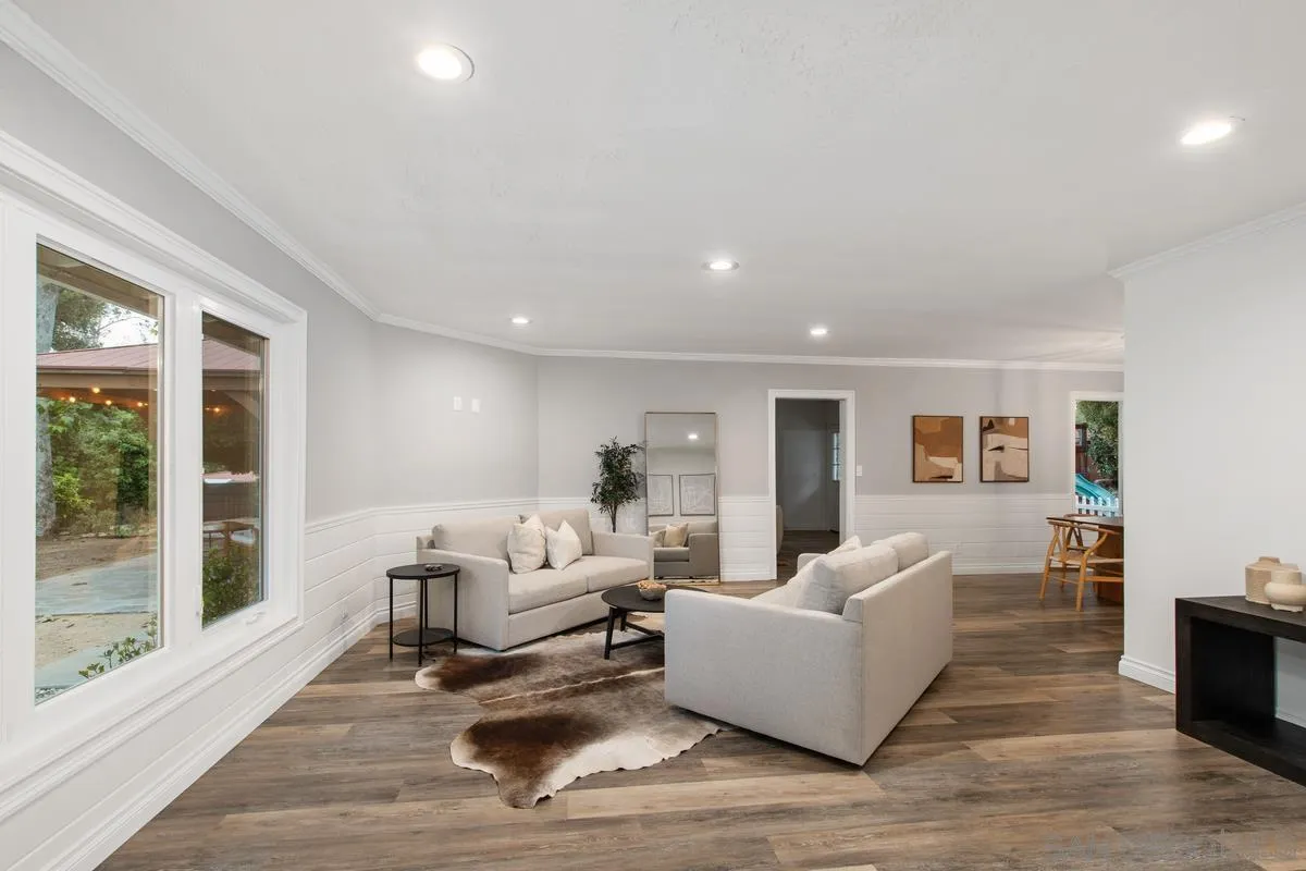 16852 Orchard Bend Road Poway, CA 92064 - Photo 8 of 39 a living room with furniture and a large window