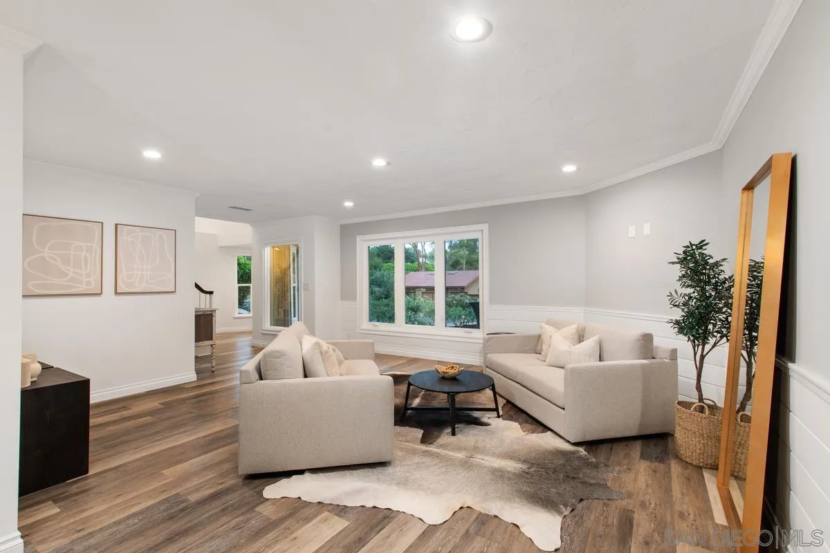 16852 Orchard Bend Road Poway, CA 92064 - Photo 9 of 39 a living room with furniture and a large window