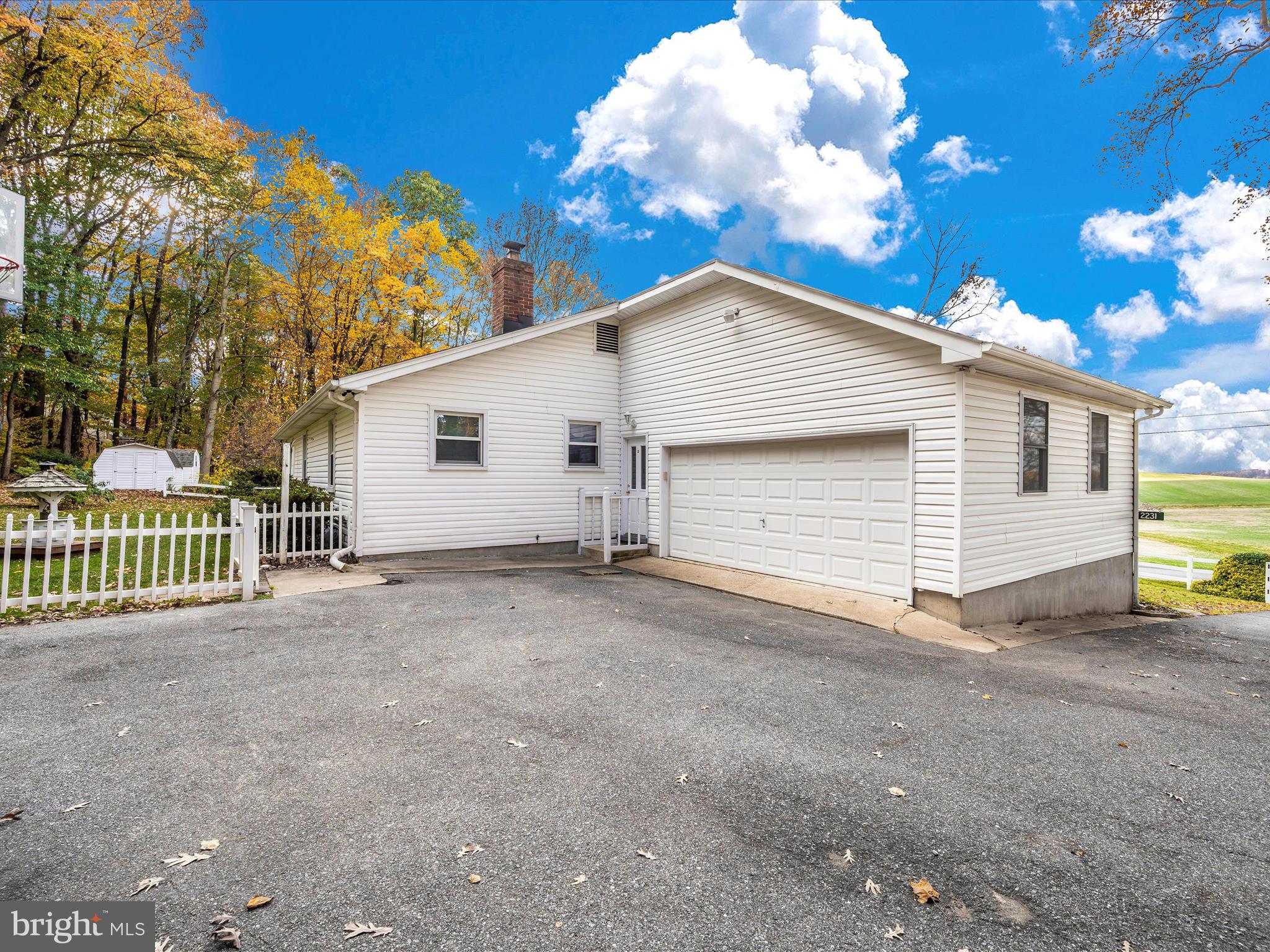 2231 Dr Stitely Road New Windsor, MD 21776 - Photo 32 of 42 Exterior Back w/2 car garage and plenty of parking