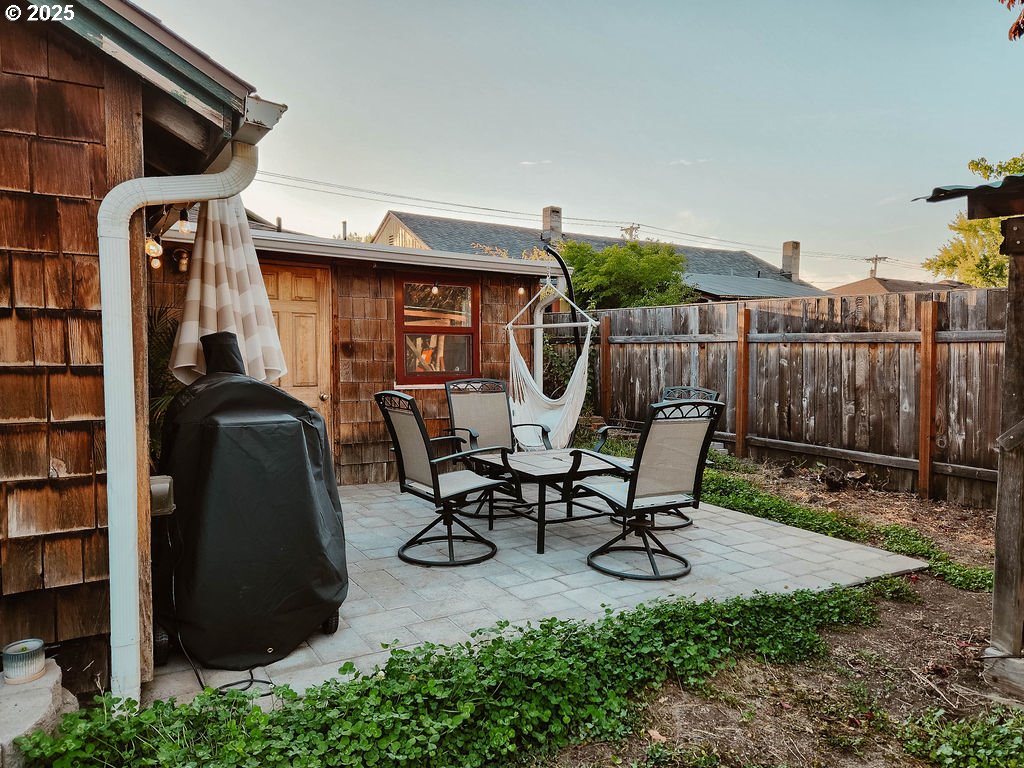 1895 City View Street Eugene, OR 97405 - Photo 32 of 36 a view of a chairs and table in backyard