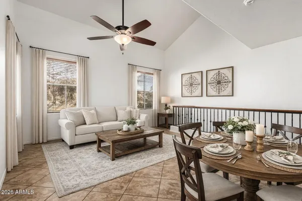 a living room with furniture and a window