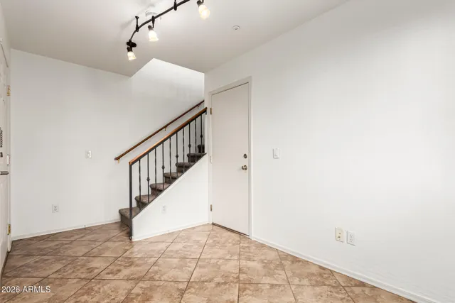 a view of an entryway with staircase