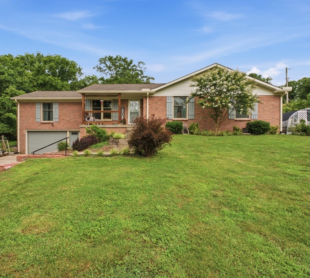 255 St Mary's Road Buffalo Valley, TN 38548 - Photo 2 of 36 a front view of house with yard and green space