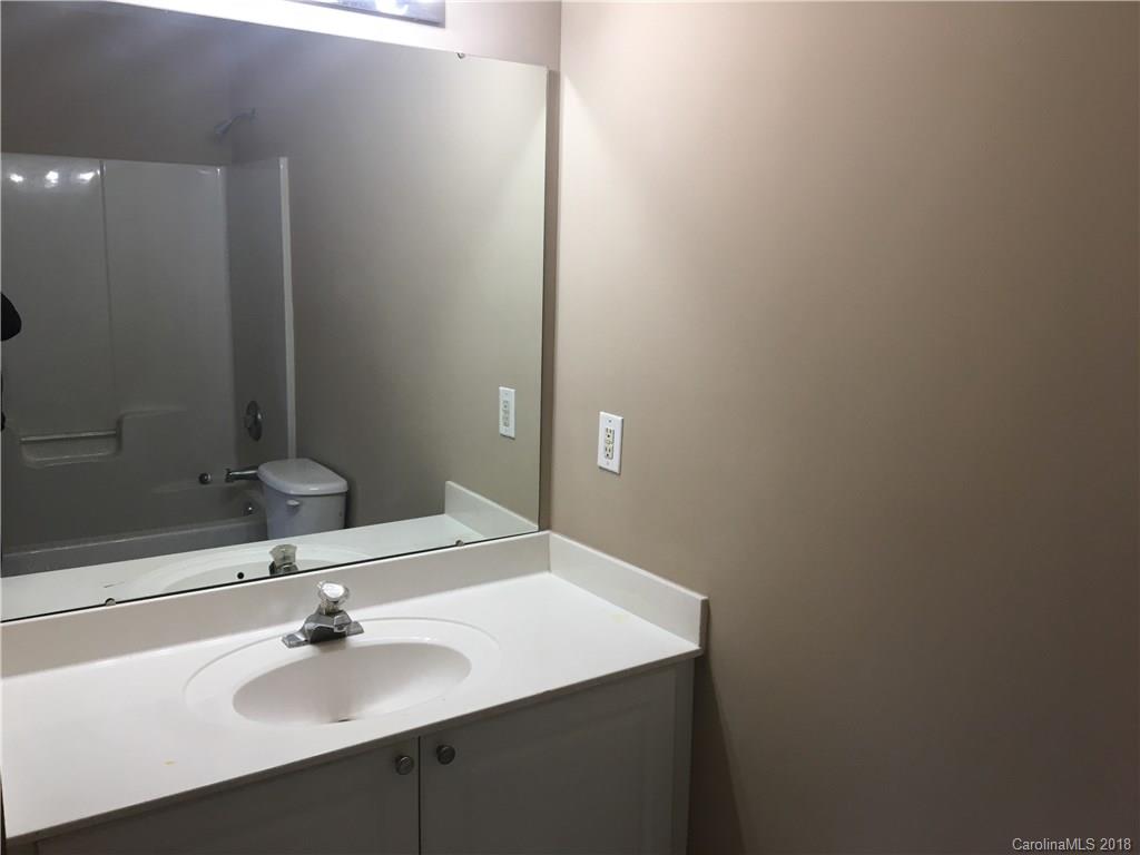 1119 Hannah Rae Court Charlotte, NC 28214 - Photo 12 of 12 a bathroom with a sink and a mirror