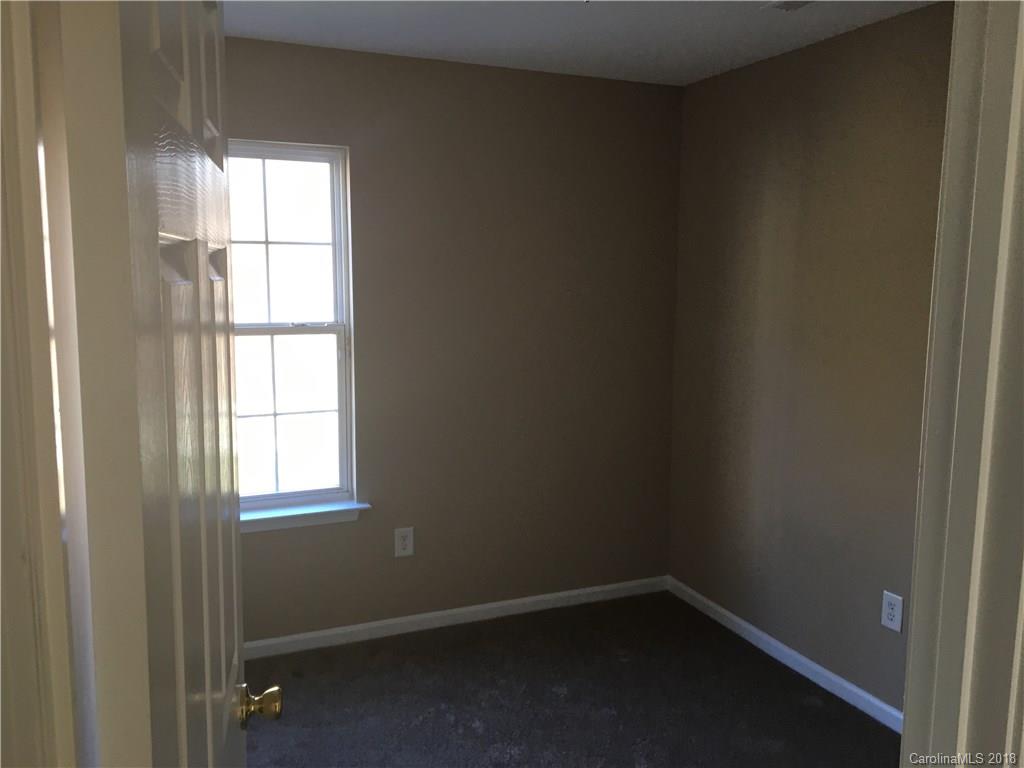 1119 Hannah Rae Court Charlotte, NC 28214 - Photo 4 of 12 an empty room with a window
