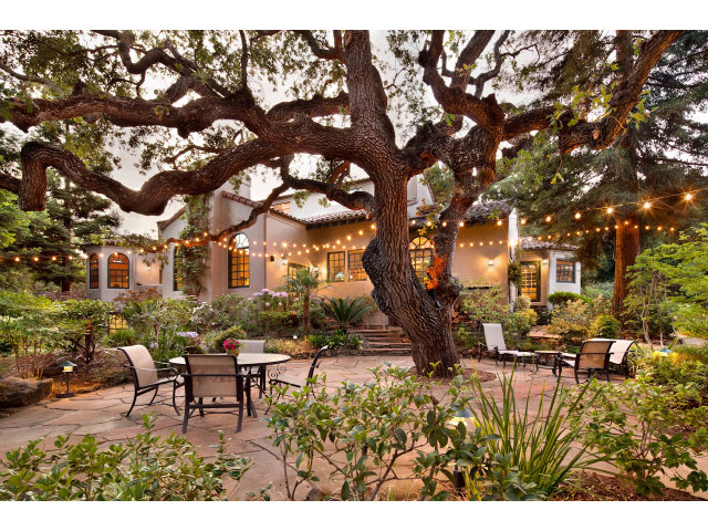a view of a building with sitting area