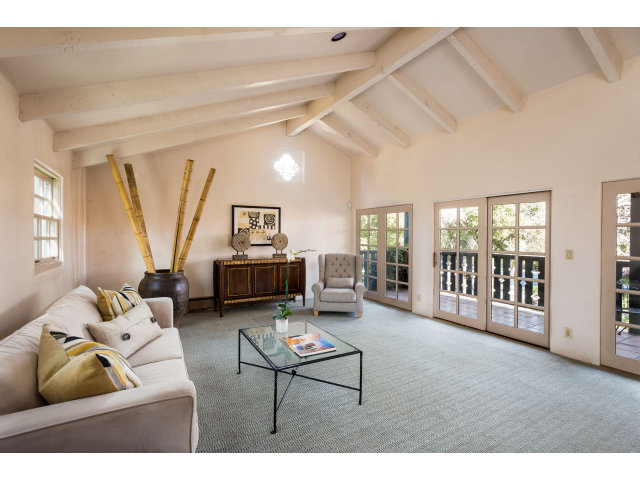 953 Roble Ridge Road Palo Alto, CA 94306 - Photo 5 of 7 a living room with furniture and a window