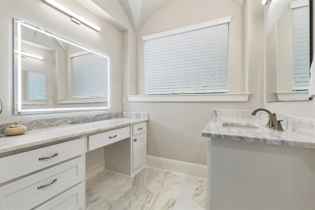 6700 Herbert Road Colleyville, TX 76034 - Photo 8 of 32 a bathroom with a granite countertop sink and a mirror
