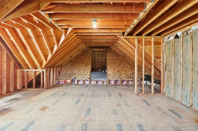 a living room with furniture a fireplace with wooden floor