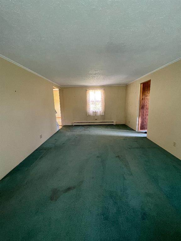 258 Highland Road Rochester, PA 15074 - Photo 5 of 6 a view of an empty room with window and stairs