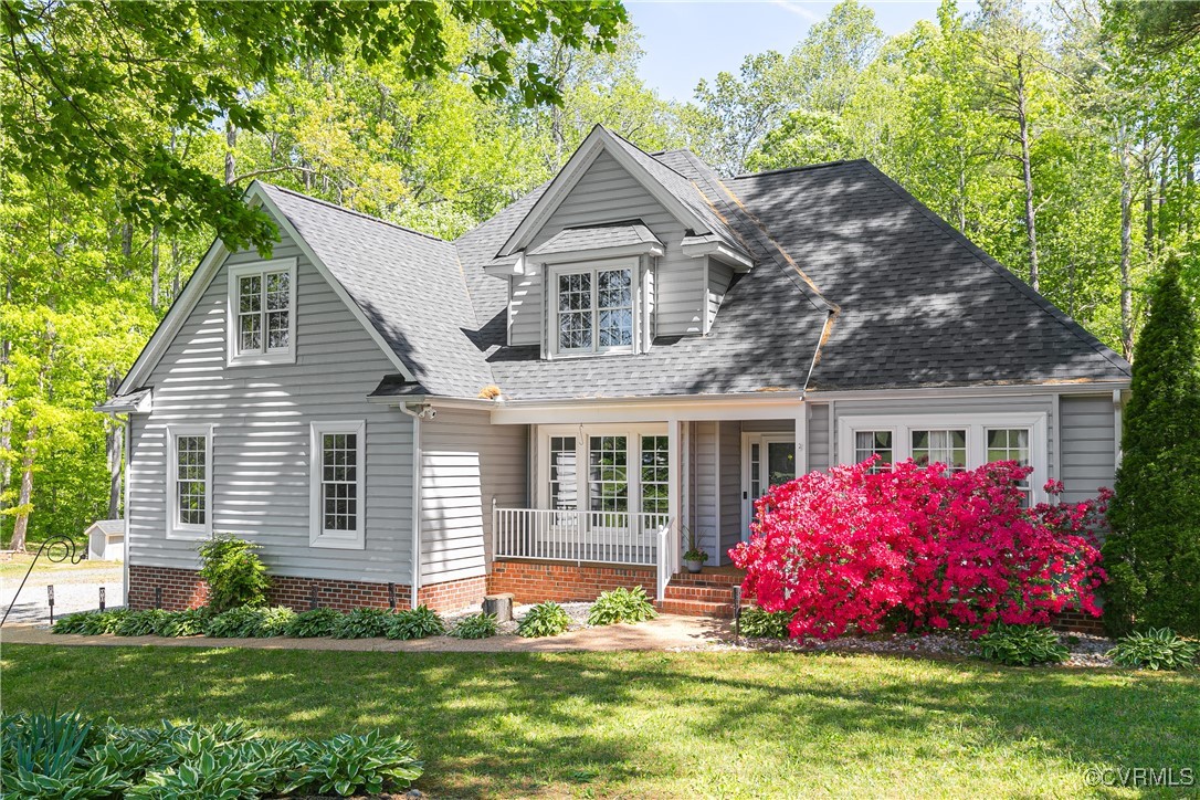 17476 Parsons Ridge Road Beaverdam, VA 23015 - Photo 1 of 40 a front view of a house with a yard
