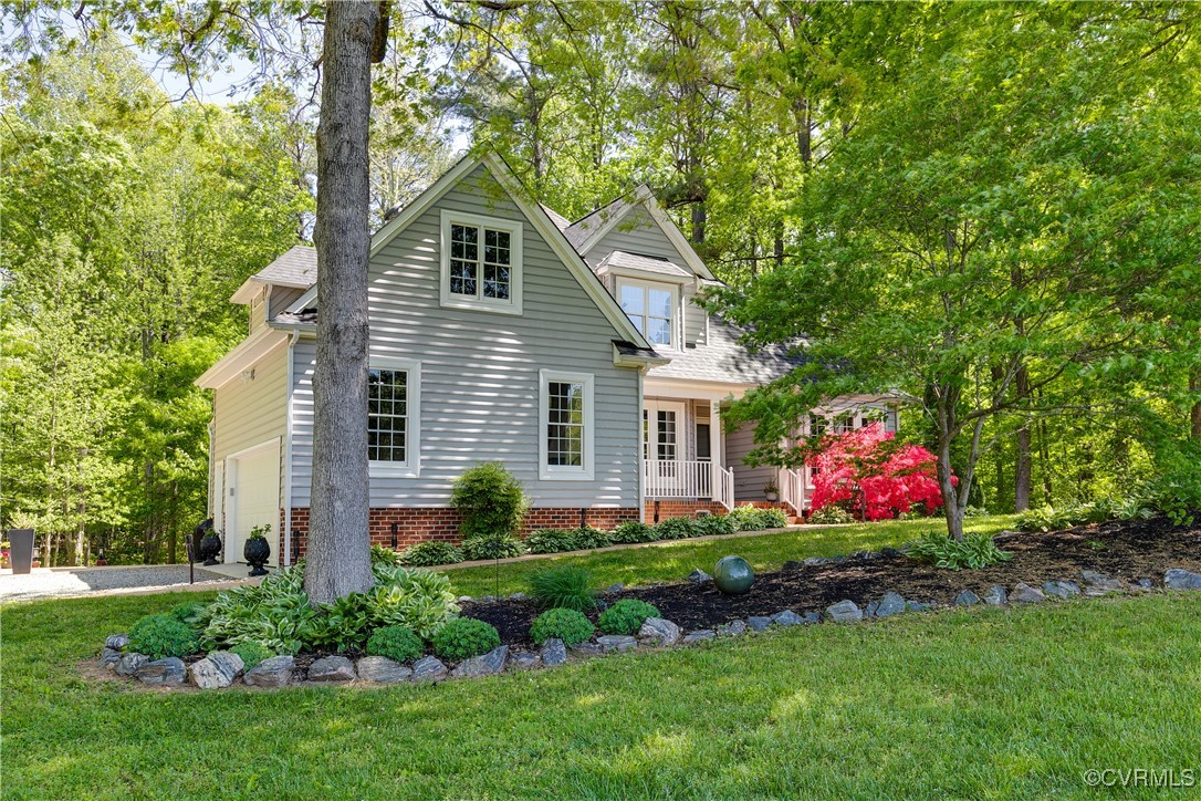 17476 Parsons Ridge Road Beaverdam, VA 23015 - Photo 2 of 40 a front view of house with yard and green space