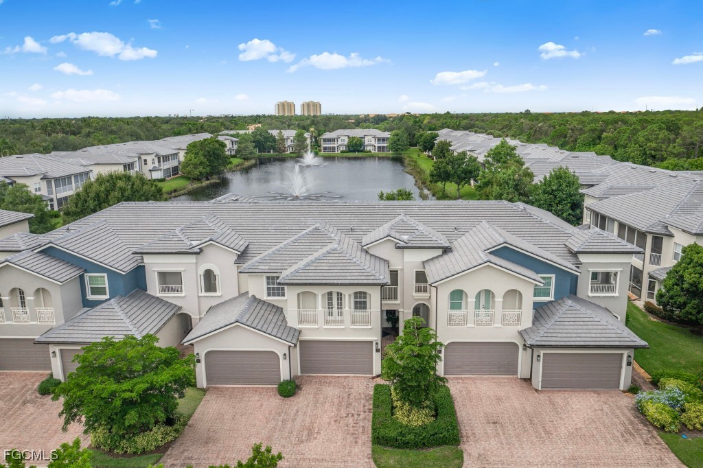 3610 Lansing Loop, Unit 102 Estero, FL 33928 - Photo 27 of 27 an aerial view of a house