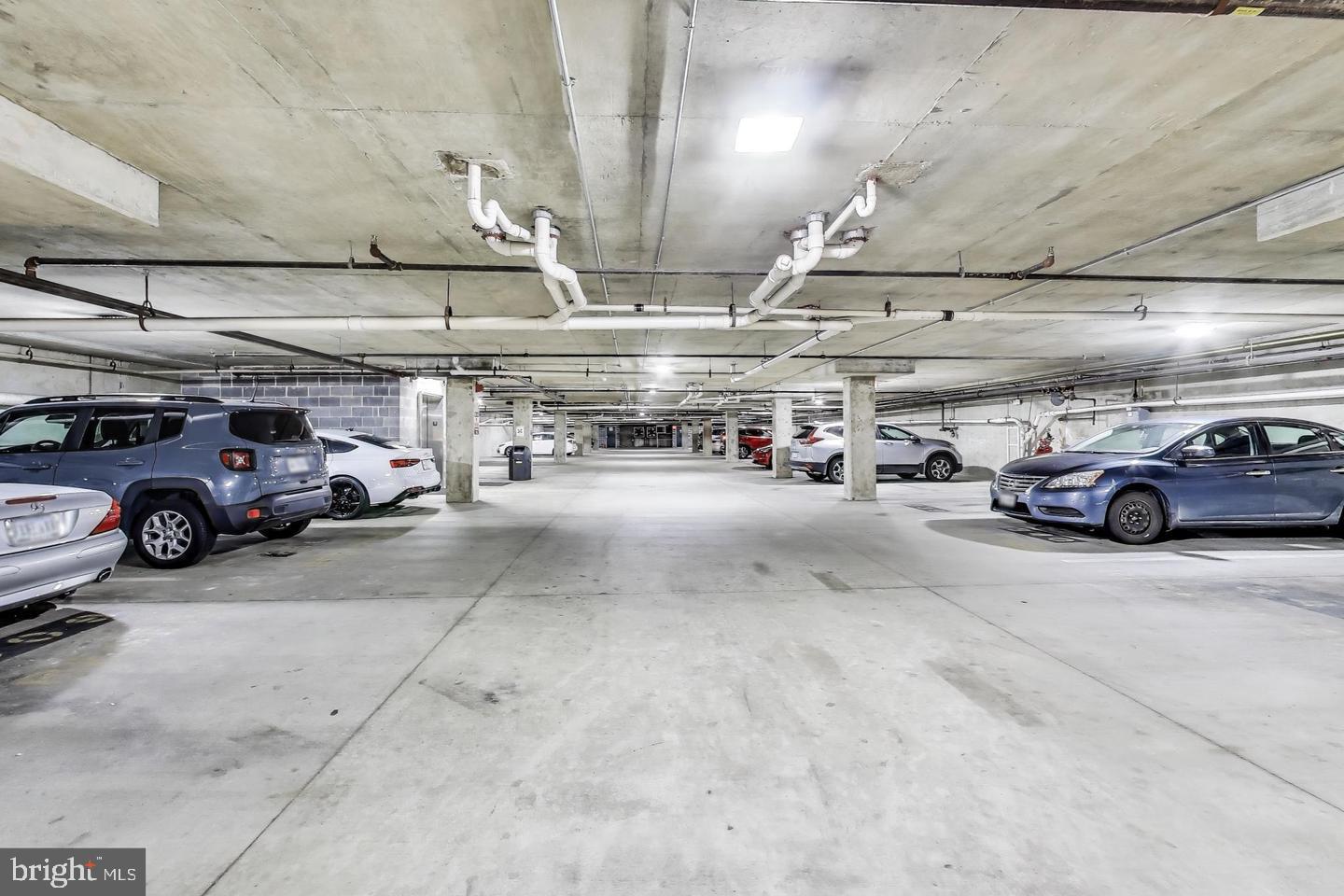 1601 Spring Gate Dr., Unit 1204 McLean, VA 22102 - Photo 26 of 52 a view of parking garage with cars