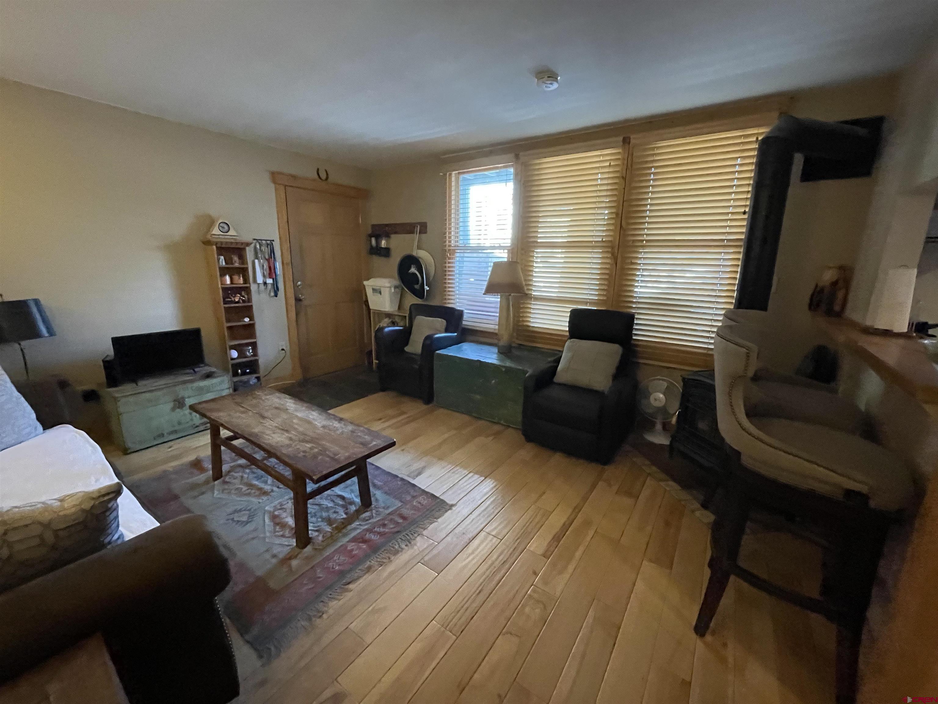 28 Whiterock Avenue, Unit 2 Crested Butte, CO 81224 - Photo 21 of 31 a living room with furniture and a window