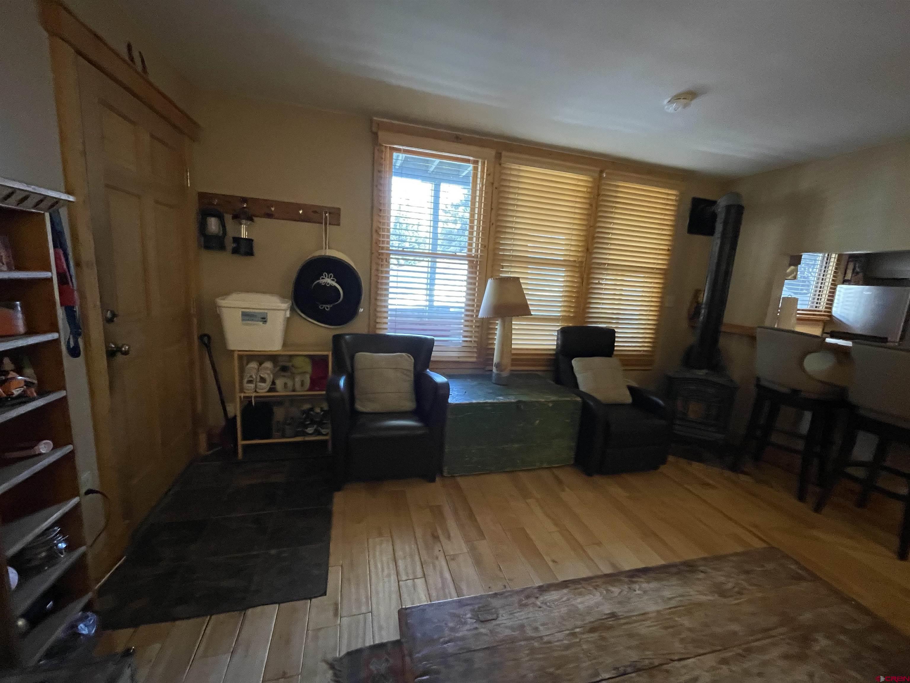 28 Whiterock Avenue, Unit 2 Crested Butte, CO 81224 - Photo 23 of 31 a living room with furniture and a fireplace