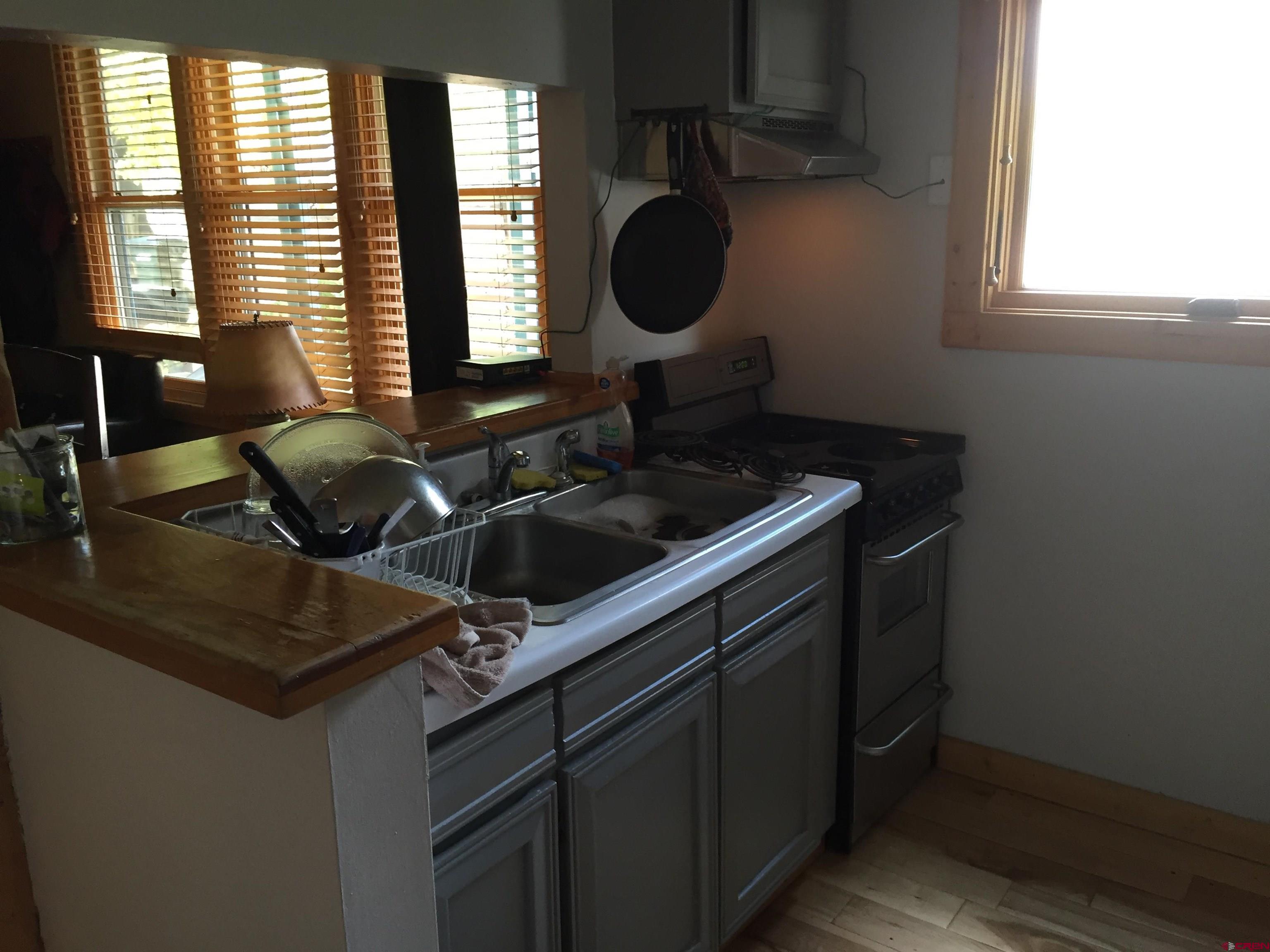 28 Whiterock Avenue, Unit 2 Crested Butte, CO 81224 - Photo 26 of 31 a kitchen with a sink and a window