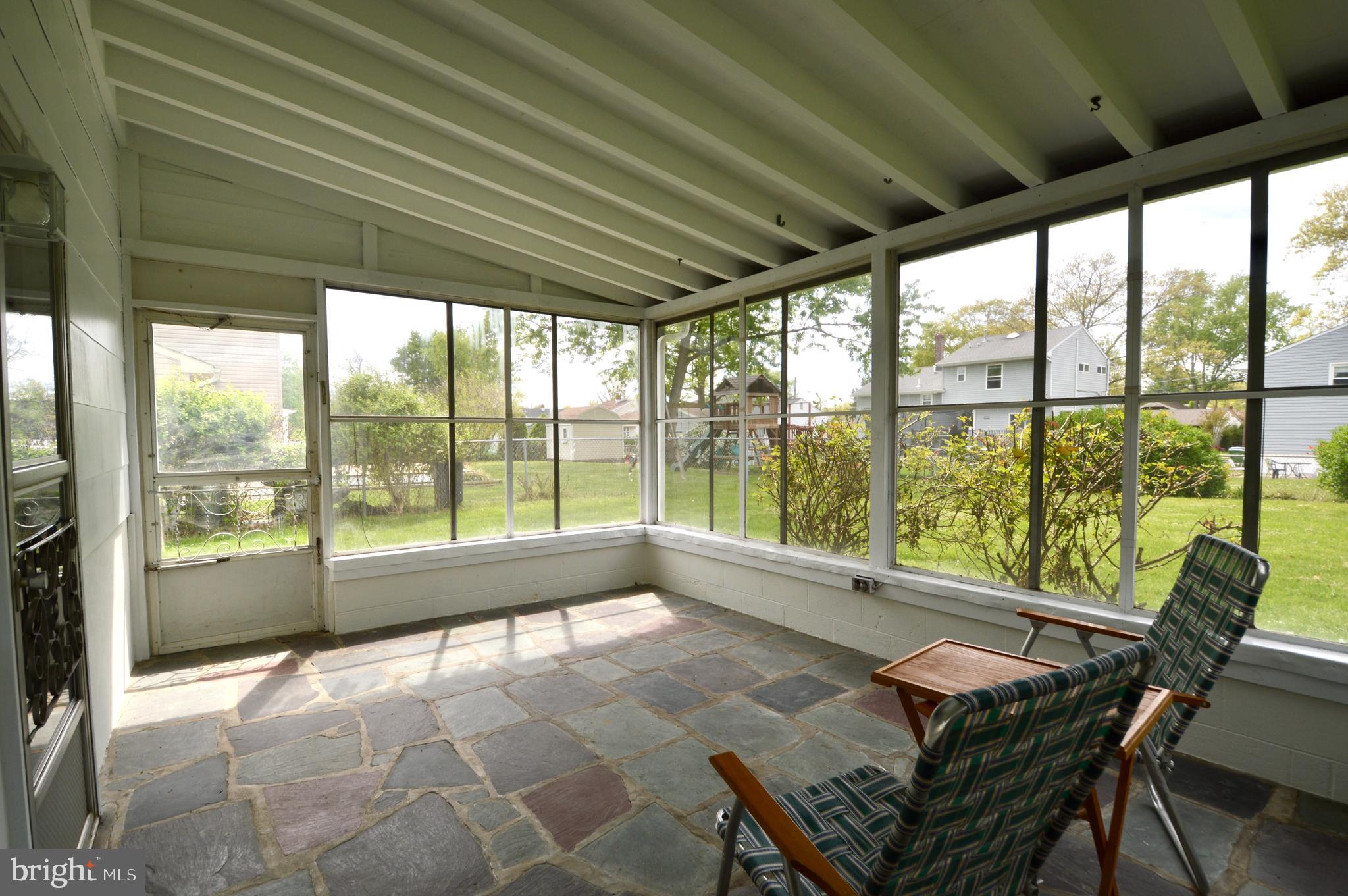 119 Ashbrook Road Cherry Hill, NJ 08034 - Photo 15 of 16 a living room with a large window and a table
