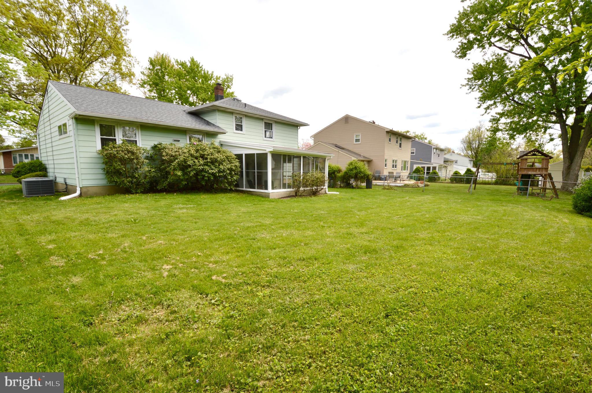 119 Ashbrook Road Cherry Hill, NJ 08034 - Photo 16 of 16 a front view of a house with a garden