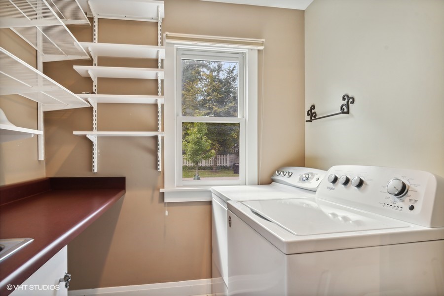 1282 Edgewood Road Lake Forest, IL 60045 - Photo 13 of 27 a utility room with dryer and washer