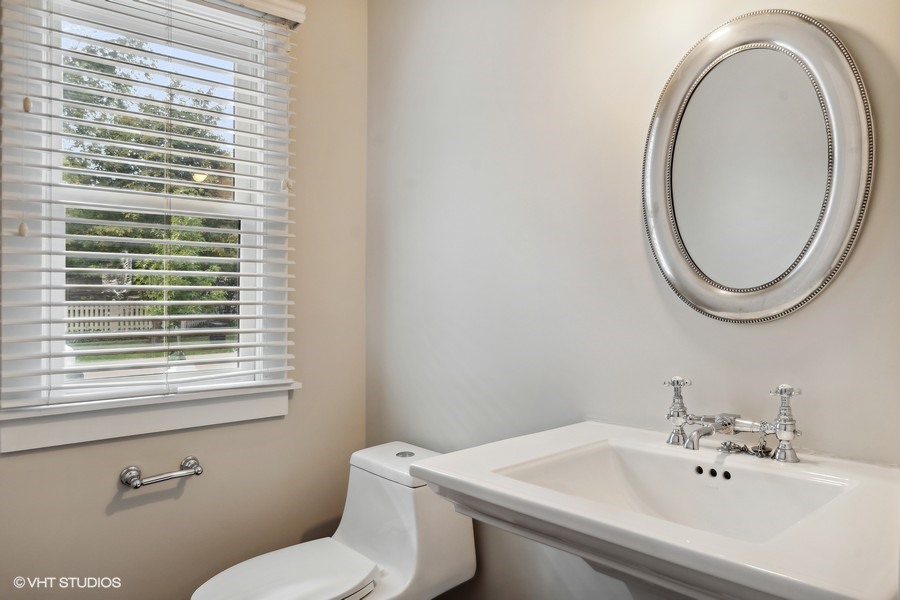 1282 Edgewood Road Lake Forest, IL 60045 - Photo 14 of 27 a bathroom with a sink and a toilet
